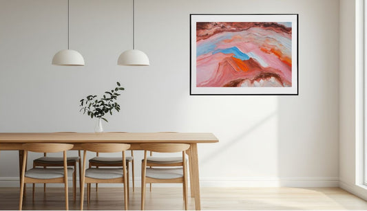 Abstract colourful landscape art framed and hanging on wall in dining room