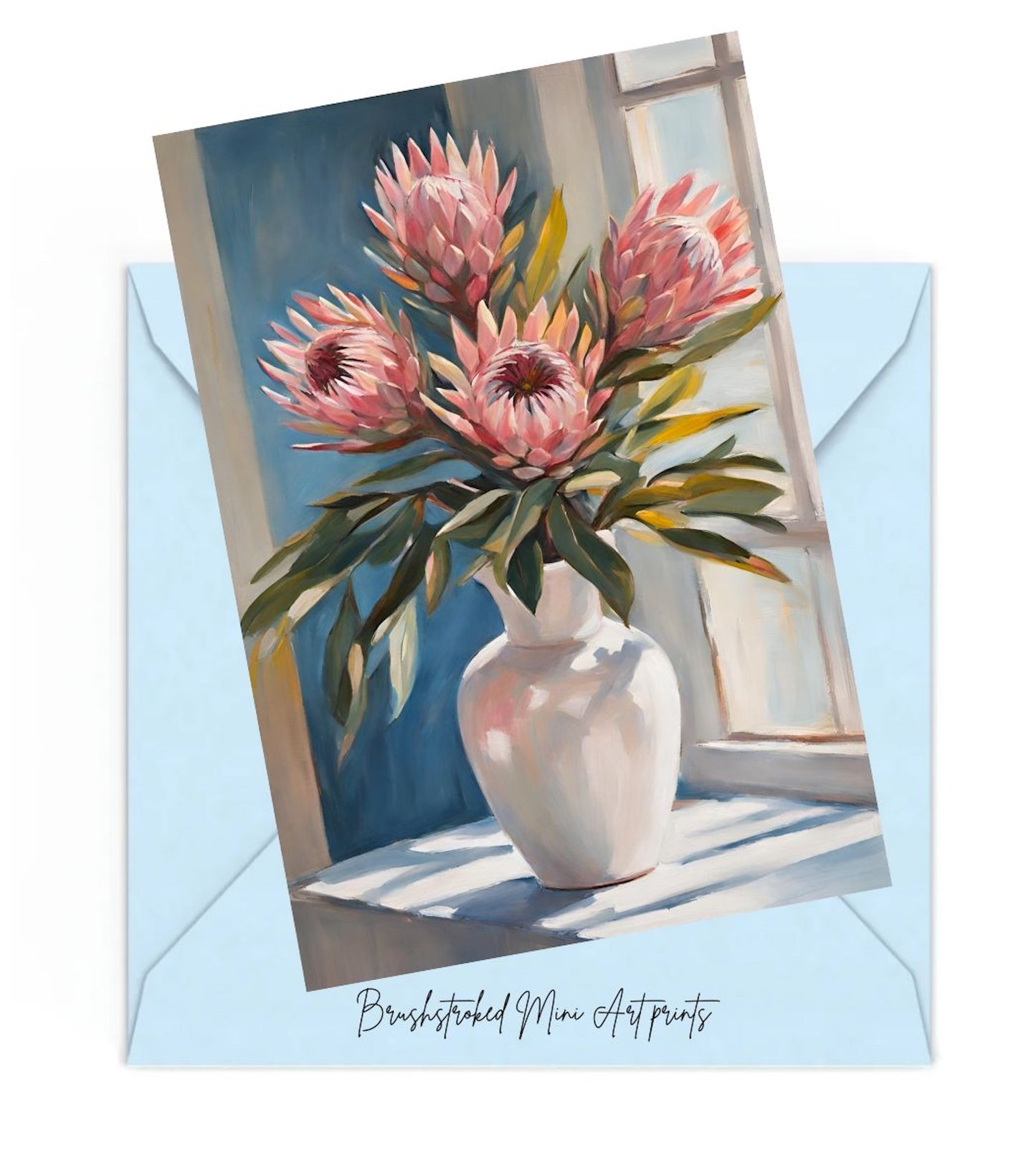 Framed artwork of pink protea flowers in a white vase on a light blue background