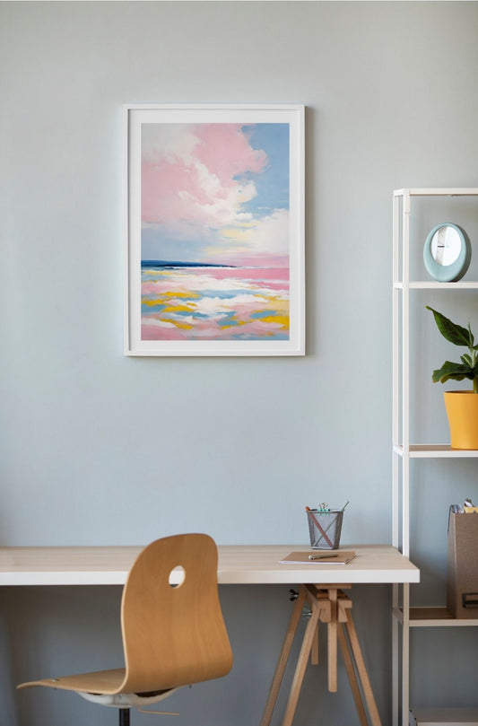pastel coloured abstract painting of a seascape framed and hanging on wall above a desk
