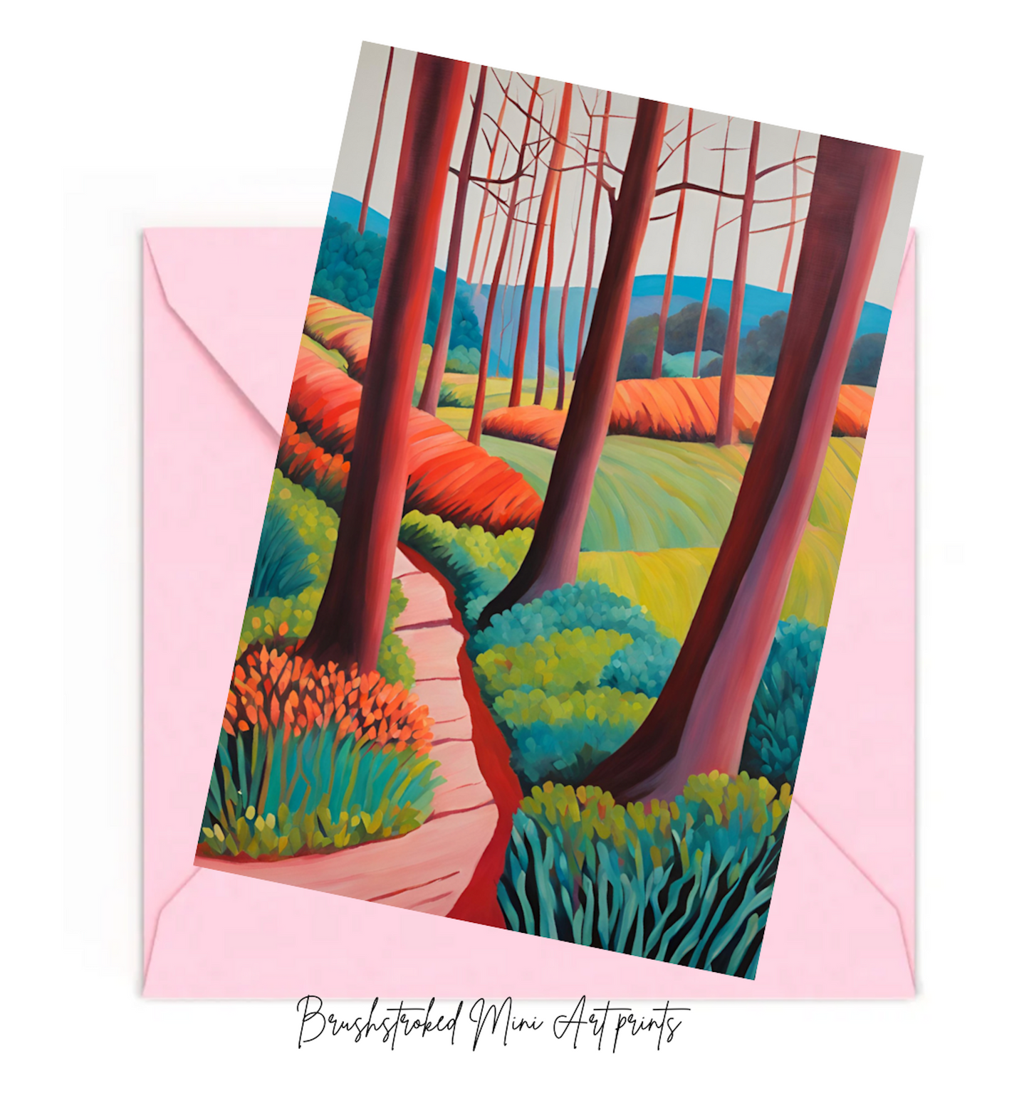 Colorful forest scene mini art print with a pink envelope