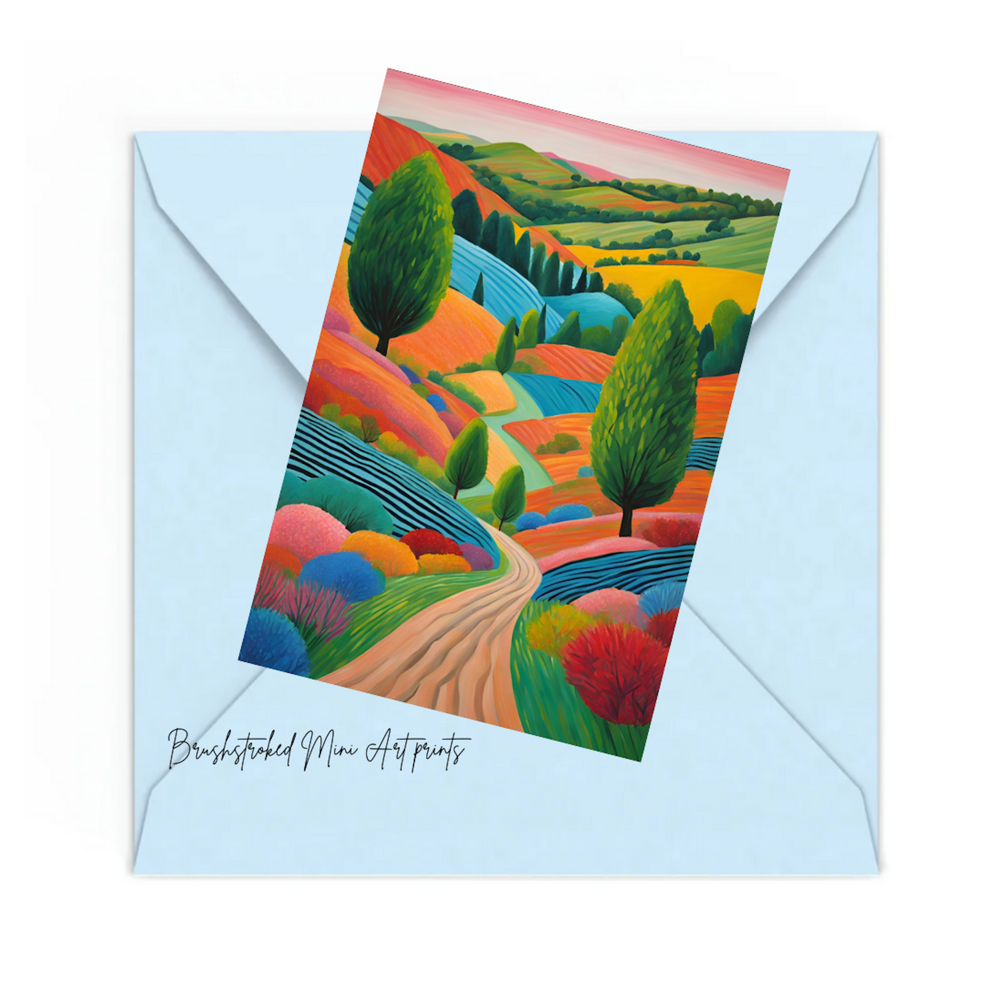 whimsical colourful hockney style landscape mini print on top of blue envelope.