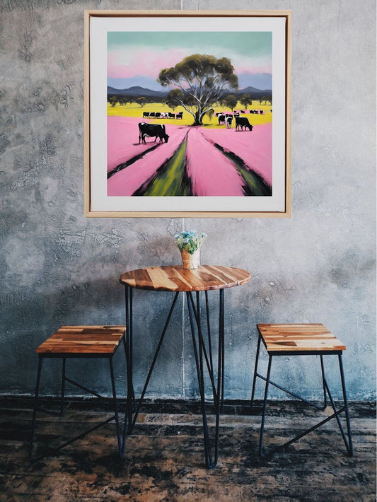 grampian mountain, victoria australia cows gum trees and canola fields and pink wild flowers art print hanging on the wall framed.