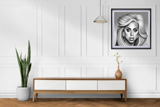 black and white portrait of lady gaga framed art hanging in room