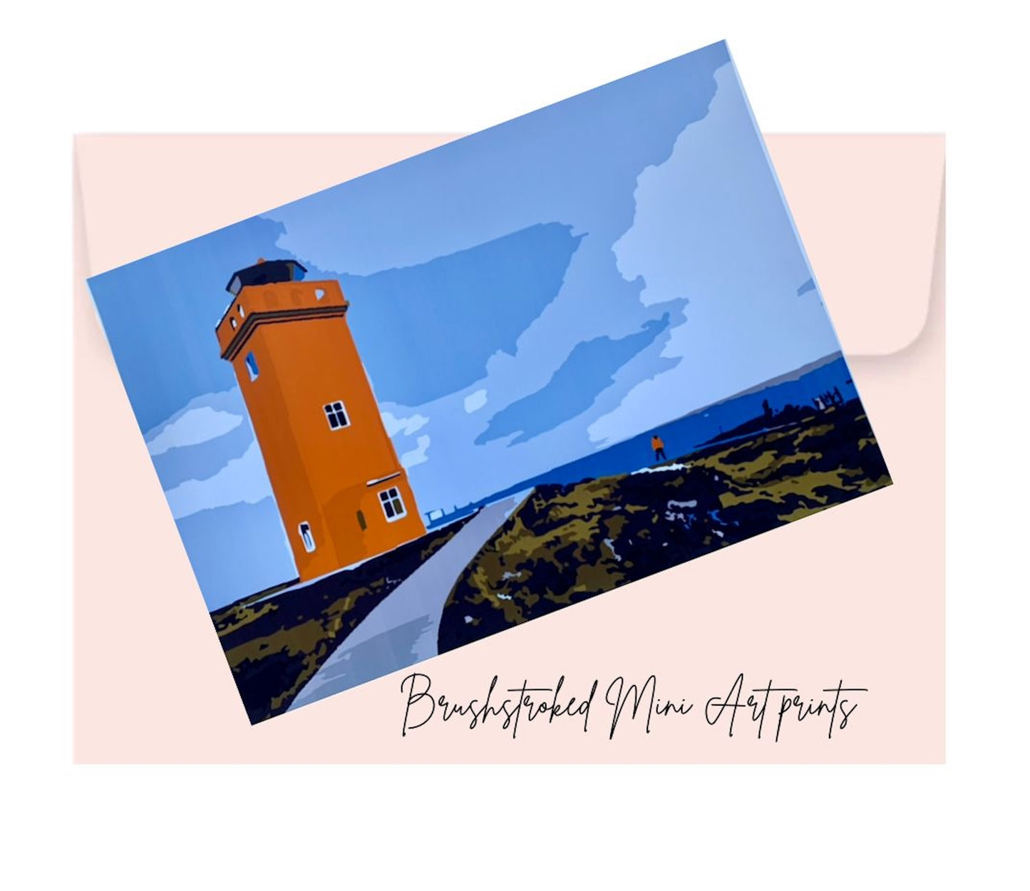 orange lighthouse on cliff with apth sea and blue skies mini art print on top of pink envelope