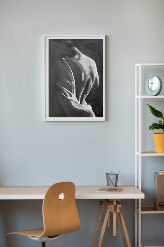 partial_nude_black_and_white_woman_portrait_art_print framed hanging on wall above a table