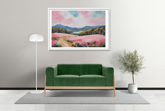 patel coloured australian landscape painting hanging above a sofa on a wall