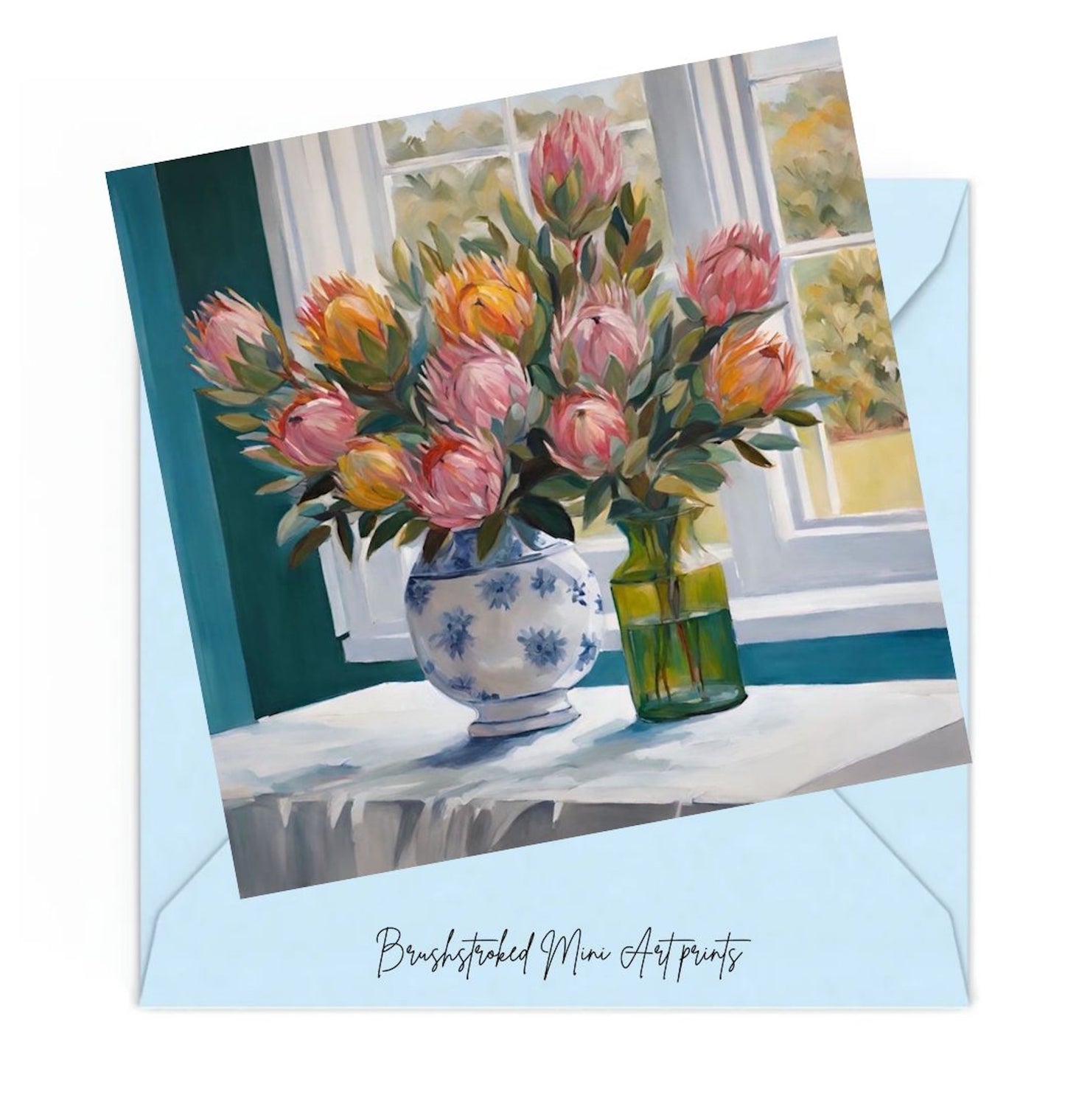 pink and orange proteas in vases on table near window mini art print.