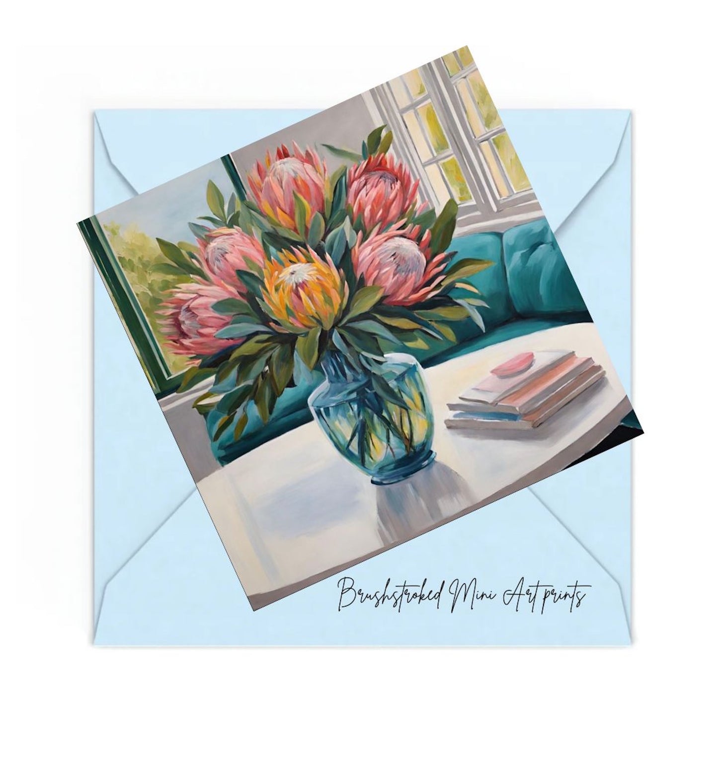 Pink Proteas in blue glass vase on table mini art print