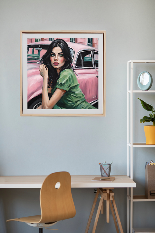 portrait style woman with black hair and green eyes in Green dress near pink vintage car art print framed in wood hanging on wall.