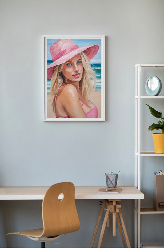 woman pink hat beach art on wall