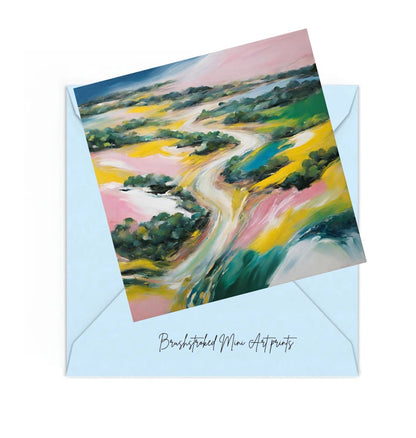 Colourful mini art print of Australian landscape, on top of a Blue envelope