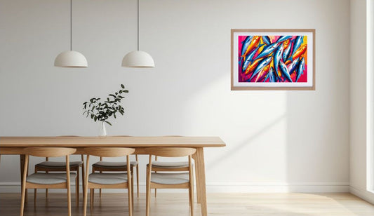 Colourful sardines art print framed and hanging on the wall in a dining room setting.
