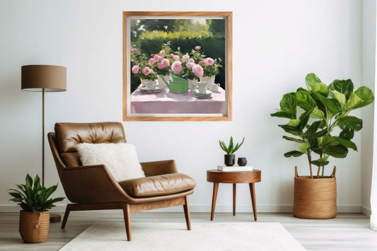 Living room with a brown leather armchair, framed artwork of Roses and tea cups and potted plants.