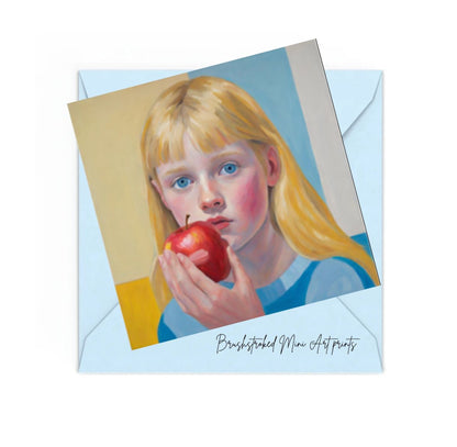 blue eyed blonde haired girl in blue dress eating a red apple mini art print