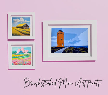 mini art prints framed and hung on wall 