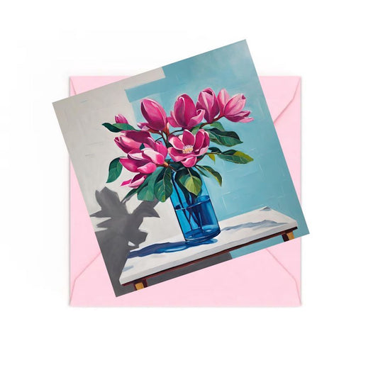 Pink Magnolias mini art print on top of a ink envelope