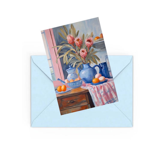 Blue jug Pink Proteas On table Mini art print on Blue envelope