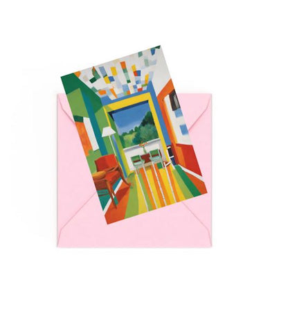 Abstract mini art print of a room with colourful geometric patterns on top of an envelope