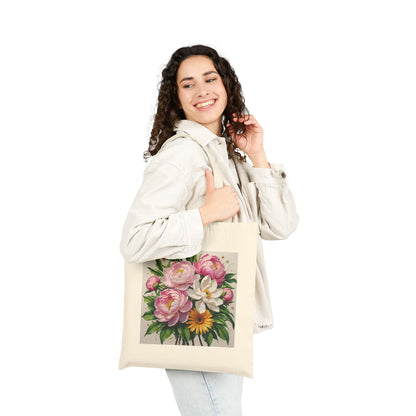 A woman a carrying Canvas tote bag with  Pink, White and yellow floral print.