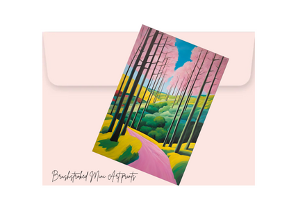 whimsical mini art landscape art nprint on top of a pink envelope