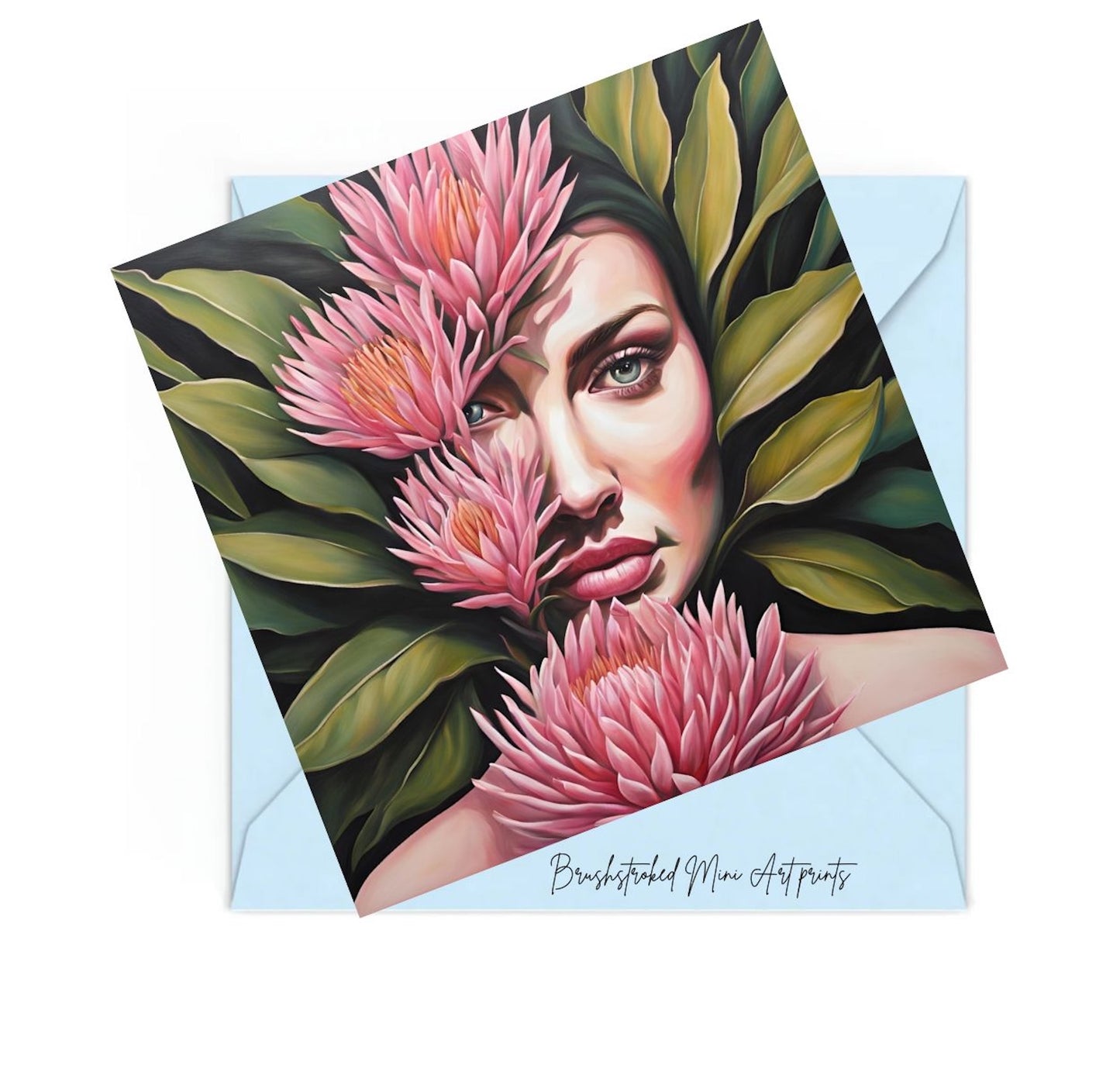 mini art print of a blue eyed woman's portrait with Pink flowers and green leaves