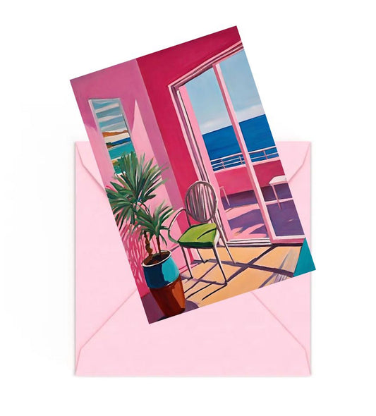mini art print of a hockney style colourful room scene with an ocean view, on top of a Pink envelope