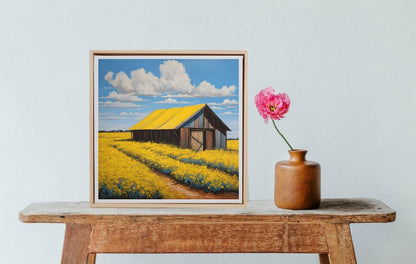Old farmhouse in canola field art print  framed in wood and sitting on table next to vase a