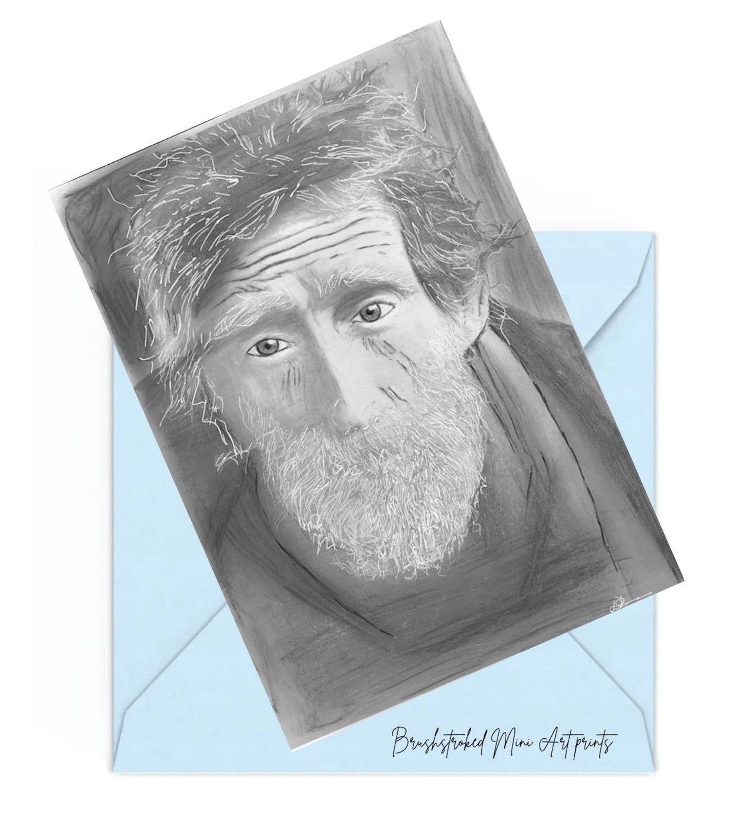 old man with with beard mini portrait art print on top of a blue envelope