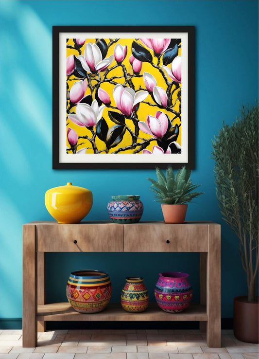 Framed floral artwork on a blue wall above a wooden console table with decorative vases.
