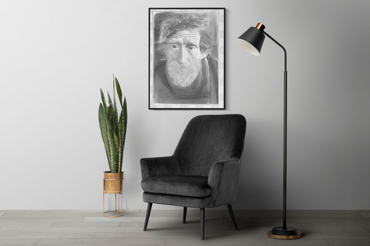 portrait mini art print of an old man with sad eyes framed and hanging on wall