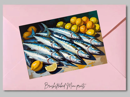 silvery sardines in a pile with lemons mini art print on pink emvelope