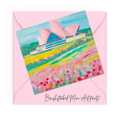 mini art print of the sydney opera house colourful and abstract on top of a pink envelope