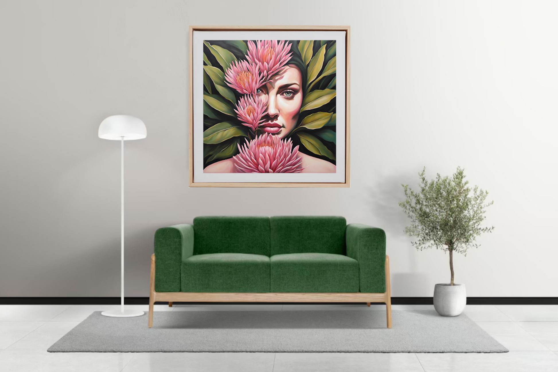 a portrait painting of a woman with her face covered with beautiful pink protea flowers and green eaves hanging above a sofa on a wall.